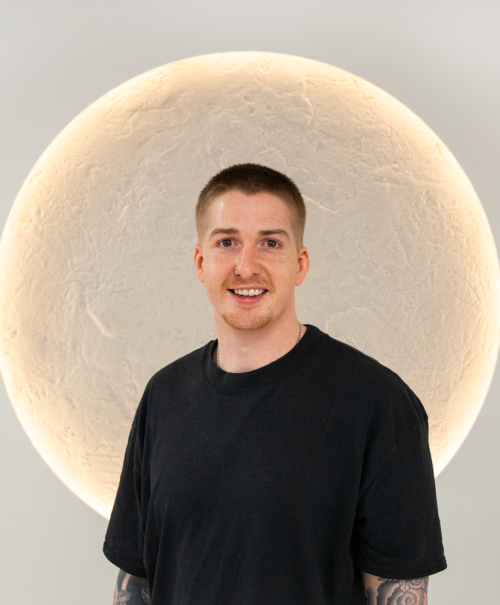 A picture portrait of Travis Robbins, Search Theory's SEO Manager