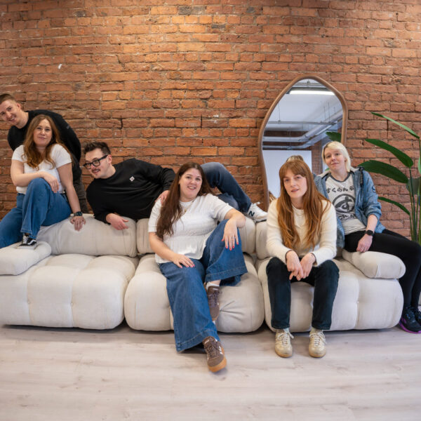 The Search Theory team relaxing on the sofa