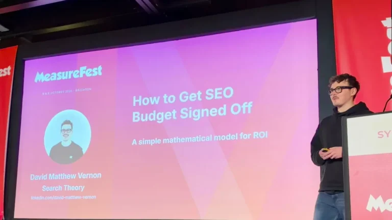 David Matthew Vernon on stage at MeasureFest presenting How to Get SEO Budget Signed Off